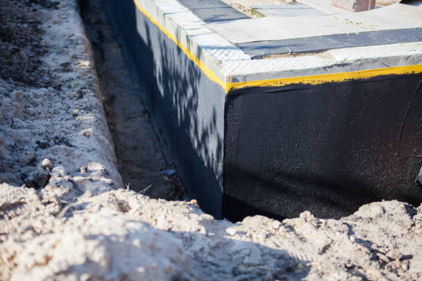 Professional Emergency Waterproofing technician working in Brownstown, IN